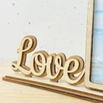 Dettaglio cornice Love con foto di coppia ArteCreare Dettaglio cornice Love con foto di coppia ArteCreare